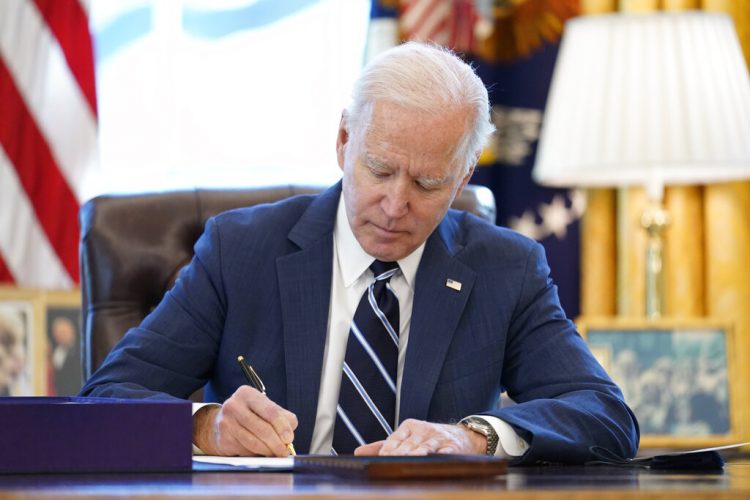 Biden signs big virus aid bill